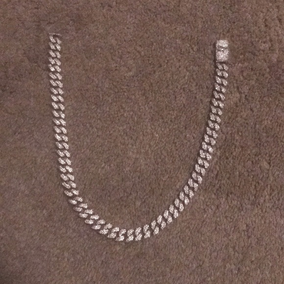 Iced out 12mm Cuban link chocker.